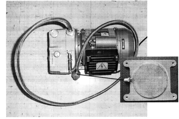 Figure 3-5:  Vacuum  pump and  hose  shown  with  vacuum chuck  and barb