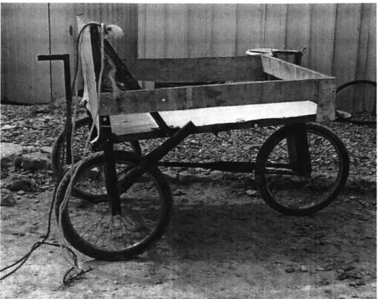 Figure  1-3:  An  example  of  a  simple  wagon  constructed  by  a  resident  of  the Azraq camp  for transporting  water from the  cistern