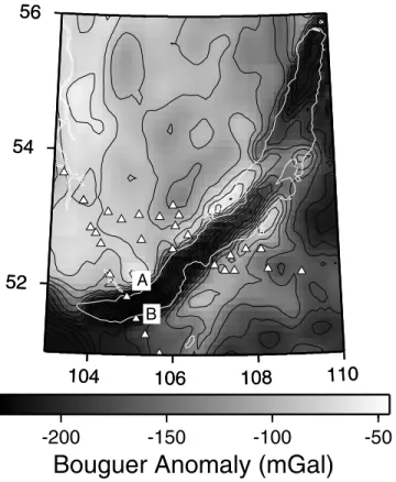 Figure 3. Complete Bouguer anomaly versus mean P wave delay time at each station. Grey triangles represent the stations before water and sediments correction, black circles represent the stations after correction