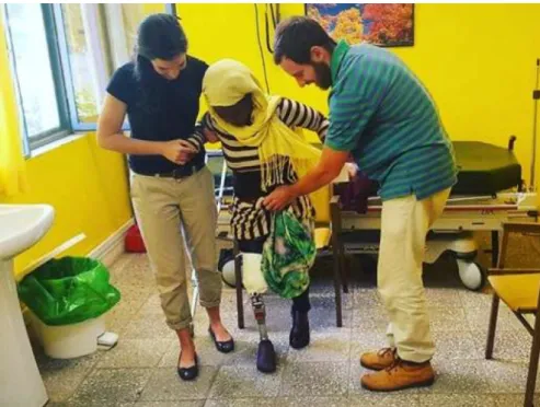 Fig. 5. Two students testing their socket prototype in a CURE International Hospital located in Addis Ababa, Ethiopia