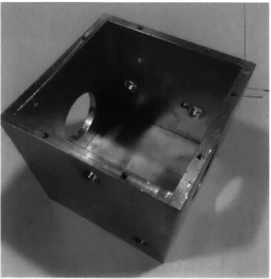 Figure  6-1:  Chamber  body:  a  milled  and  bored  square  tube.  Holes  were  drilled  into the  wall  to  allow  the  lid  to  be  screwed  on.