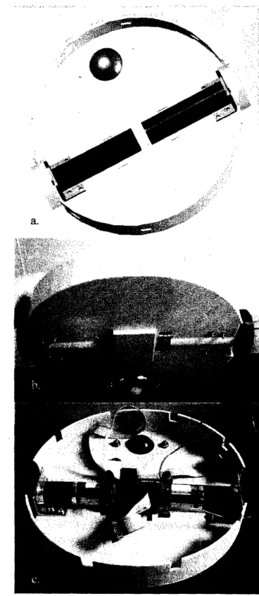 Figure  3:  Here  are  three  views  of the  base,  one  from the  top,  idealized  in  Solidworks  without  any  fasteners, one  from  the  bottom  fully  assembled,  and  one  from the top fully  assembled.