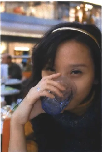 Figure  1-1:  A  person  drinks  from  a glass  of water. [KristiaanO]
