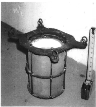 Figure 3-2: The clay-graphite  crucible  inside  the stainless  steel carriage.