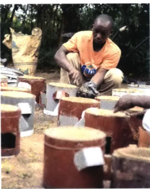 Figure  8:  Artisan  constructing  a  Makaa  Stove