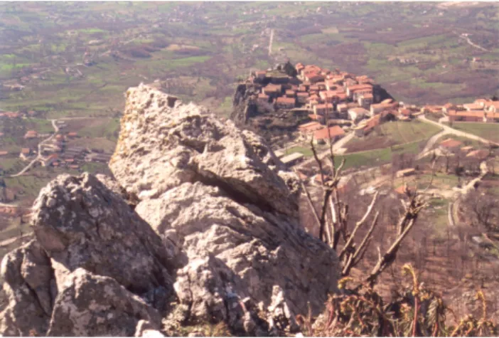 Fig. 9. View of the town of Collianello from the Mt. Marzano southwestern slope. In the foreground, highly fractured limestones, with open or loose joints in the rock mass.