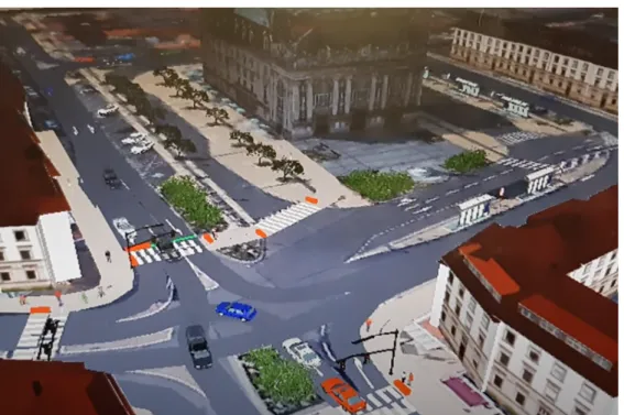 Figure 2.1 – Simulation microscopique multi-agents des véhicules motorisés, des piétons et des feux de signalisation dans un quartier de Calais