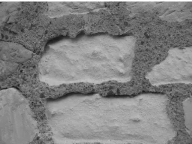 Figure 1: Deterioration of a tuffeau stone associated with the  use of cement joint mortar 
