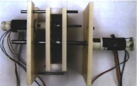 Figure  3-2:  Partially  disassembled  mechanical  setup  showing  the  two  sets  of  plates, each  holding  a  motor  and  driveshaft.