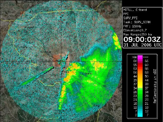 Figure 2-3: This radar surveillance scan for 31 July 2006 at 0900 UTC shows a gust front just east of the MIT radar site and the phantom line southwest of the radar site, caused by reflection off a large aircraft hangar nearby.