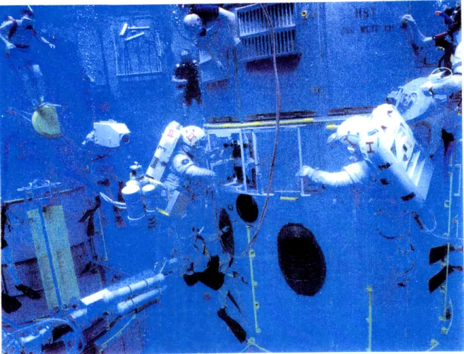 Figure 2.1  Astronauts  during  EVA training in  the Neutral  Buoyancy  Facility  at  Marshall  Space  Flight Center