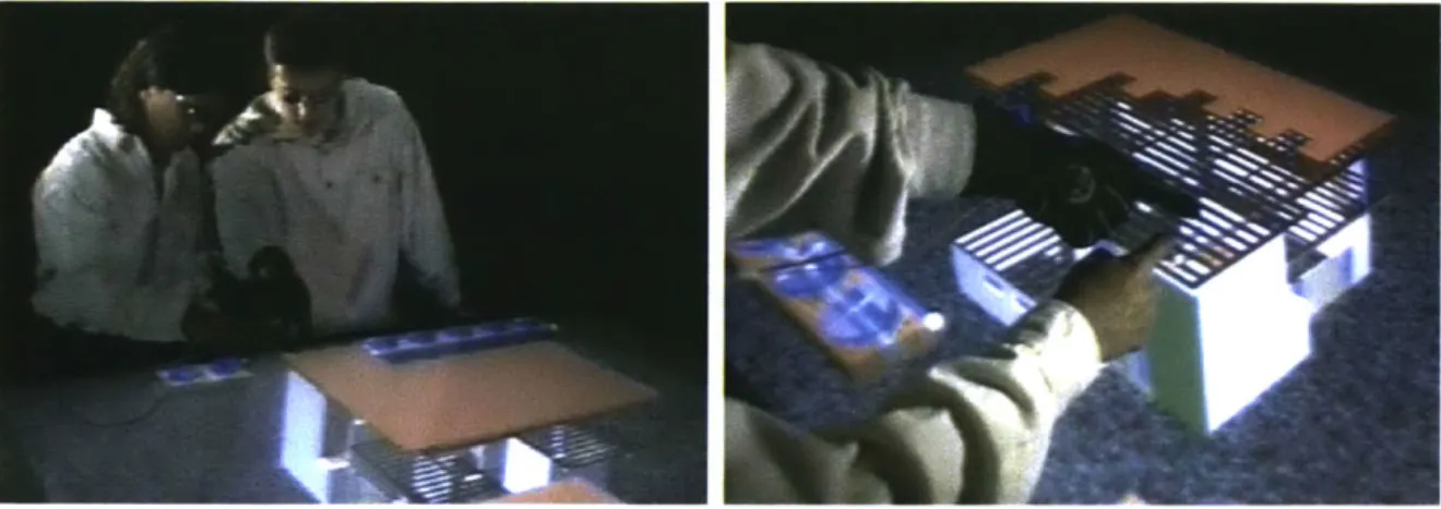 Figure  3-1:  Manipulating  information  with  the  Two  User  Responsive  Work  Bench.