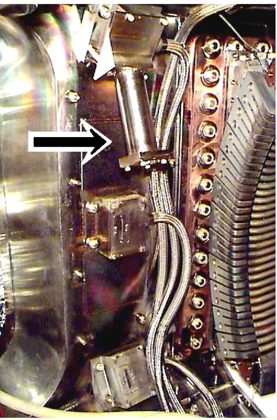 Figure 2-2: A photo of the edge x-ray imaging system, indicated by an arrow, as installed in the Alcator C-Mod vacuum vessel.