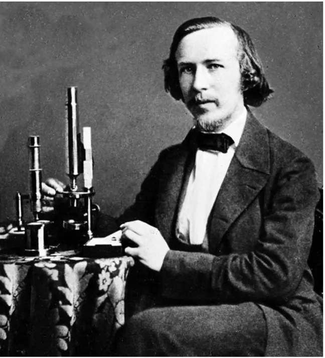 Fig. 2. Ernst Haeckel and his microscopes, ca. 1856, when he was a medical student. His parents  bought him his first microscope, a Schiek barrel microscope (on the table at the left), in 1853 and he  quickly became very fond of it, calling it &#34;my darl