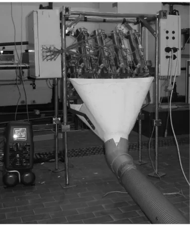 Fig.  1  -  The  multiple  launcher  with  the  electro-valves  box  (left)  and  the  electronics  box  (right), on the floor the air compressor (left) and the red pipe connected to the funnel to drive  probes outboard 