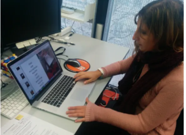 Figure 3.7. One of our participants reviewing the memory cues in a condition B