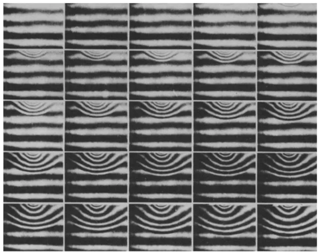 Fig. 6 Moire´-fringe patterns corresponding to vertical displacements in a marble specimen dynamically loaded on the edge; camera speed 1,004,500 frames/s; ruling 400 lines/cm