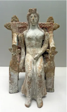 Fig. 10 – Poupée assise aux bras articulés   en terre cuite (H. 21,5 cm), de Thèbes. 