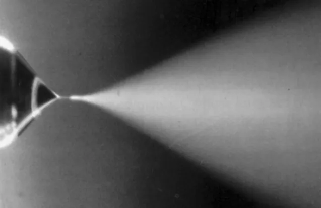 Fig. 3. Cone-jet spraying of methanol containing a small amount of hydrochloric acid [35].