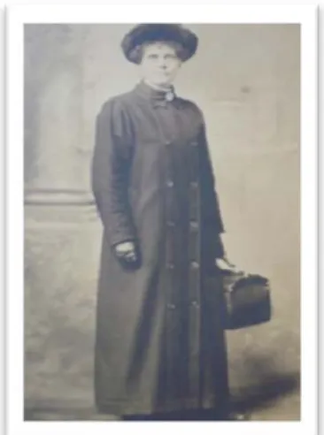Figure 2. Ottawa Public Health nurse Elizabeth  Webster carrying her bag (1920s). 