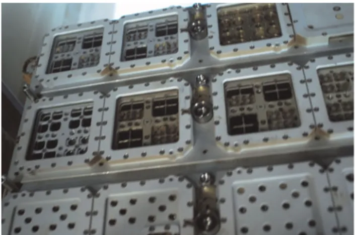 Fig. 2. Dmitriy Kondratyev with Expose-R inside the ISS when the 22 month period of external exposure was over