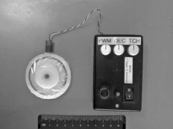 Fig. 1. The Atripump components are the dome (on the left) made of nitinol fibres embedded in a silicone rubber and the control unit (on the right).