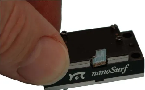 FIG. 1.  AFM scanner of the Phoenix mission with mounted silicon chip showing 8 microfabricated  cantilevers  