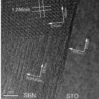 Figure 6 is a HRTEM micrograph of a cross-section showing the boundary between two SBN grains