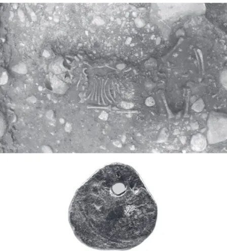 Figure 18.7  Grave, newborn baby (ten lunar months) with a funerary coin, from Aventicum,  cemetery A la montagne, St 125, 30–70 CE