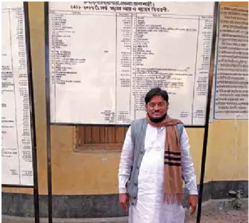 Illustration 4: Chairman of matikata Union Parishad, Rajshahi District in front of the notice  boards of his Union