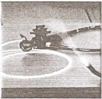 fig. 4.fibre optique, on voit la divergeance du faisceau a la sortie. [3] 
