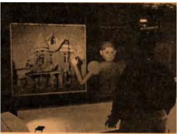 Figure 2-23 : Illustration issue de (Cassell et al. 1999) : « Rea le robot », en « pleine conversation » avec un  participant