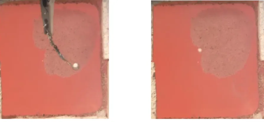 Figure 23: Placement and flotation of porous alumina sphere (desiccant) on cryolitic bath surface ©Csilla  Kaszas 
