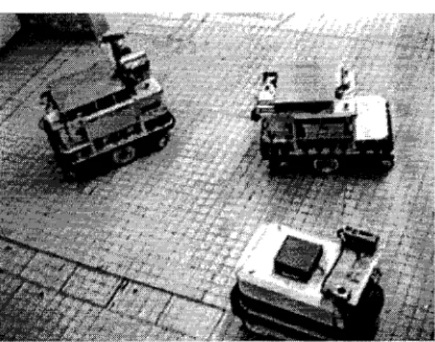 Figure  5:  T h e  Three Hilare Robots in Mission 