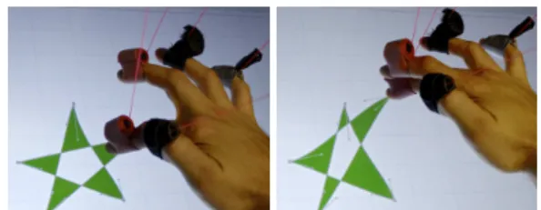 Figure 2: Notre application de dessin vectoriel intègre une GUI, mais elle peut être entièrement contrôlée grâce aux interactions  Adoirac-courcix (les mains de l’utilisateur sont représentées sous la forme d’ombres semi-transparentes).