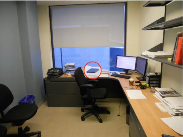 Figure	13	–	Office	of	interviewee	#18	with	mobile	magnified	(Author)	