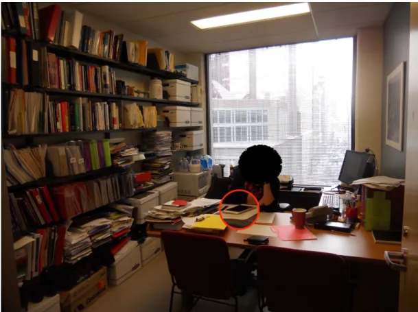 Figure	15	–	Office	of	interviewee	#20	with	mobile	magnified	(Author)	