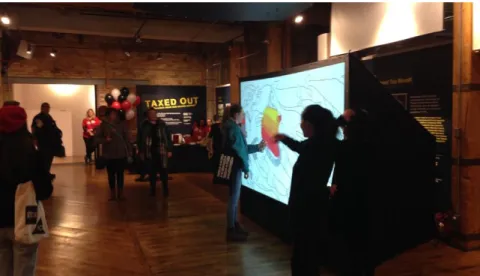 Figure 2: Interactive digital painting station at 2018 ImagineNative Art Crawl. Image courtesy of author