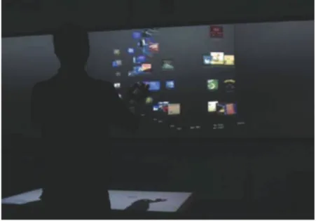 Figure 3.18: G-Stalt : L’utilisateur manipule des vidéos à l’aide de gestes main-libre