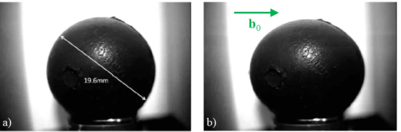 Figure 1.8: Photograph of an MRE sphere without a) and with b) an externally