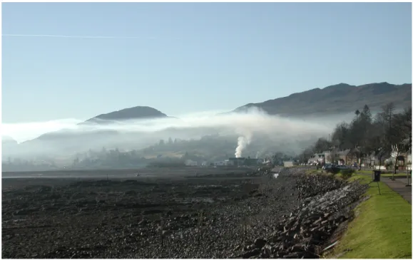 Figure 1 – Rising smoke in Lochcarron, Scotland, forms a ceiling over the valley due to a temperature inversion