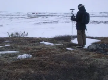 Figure 6. Photo taken in April 2010 showing sparse snow cover on the lithalsas (Lithalsa M in this case) during the field visits.