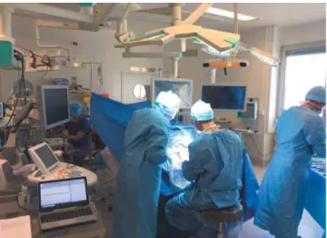 Fig. 1. Operating room of the Neurosurgery department Tours hospital. We identify the Brainlab neuronavigation system, the US Aixplorer imaging system and the computer to upload the research sequences.