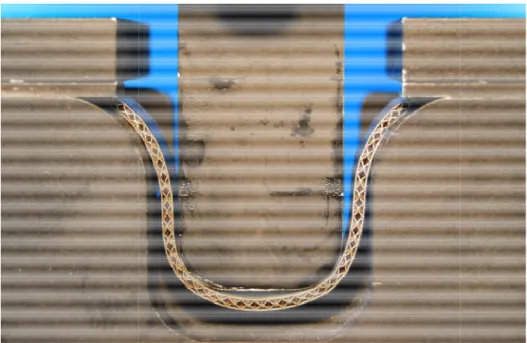Fig. 3 : Experiment of bi-directional draw bending