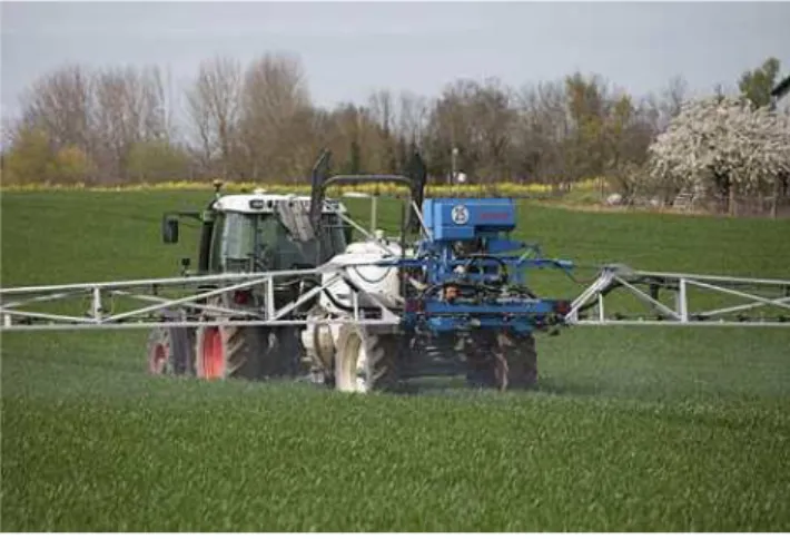 Figure 6.1 – A farmer treating a field of wheat. Phytosanitary treatments are considered as a major source of pollution in agriculture.