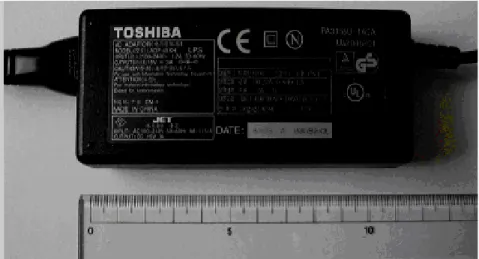Figure I.15: Comparaison de l'adaptateur secteur Toshiba et de son évolution incluant le  transformateur piézoélectrique [18]
