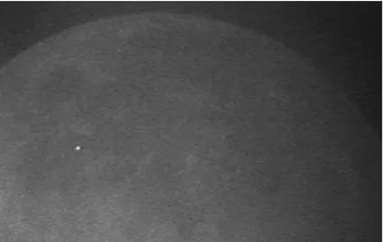 Fig. 9 An impact flash detected from one of the telescopes at Huetor-Santillàn. The Moon is illuminated only by Earthshine