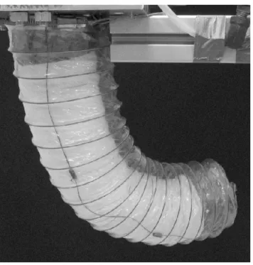 Figure 2.9: The Air-Octor hybrid manipulator composed by a pneumatic backbone which is bent by tendons, as presented in [Jones 2004b]