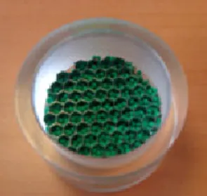 Figure 1: First experimental set-up. Transparent  box filled of particles, embedded on a 