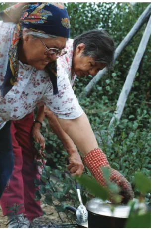 Figure 3.4  Kathleen Tooma and Ann Joseph preparing medicines (2002). 